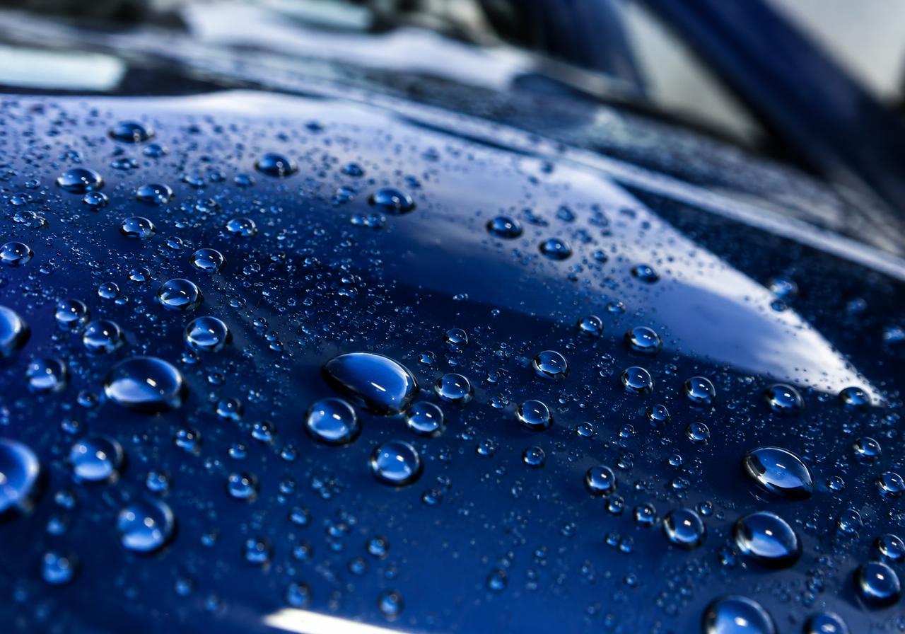 Water beading on a ceramic coated car